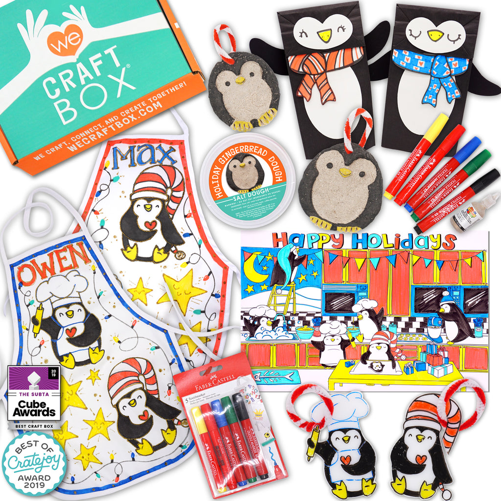 A holiday-themed craft kit for kids featuring DIY aprons, salt dough and shrinky dink ornaments, penguin puppet crafts, a baking-themed coloring poster, fabric markers, and puffy paint.